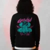Growled Printed Sweatshirt Black cartoon with a colorful Growled graffiti-style character graphic on the back