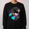 Neon Skater Cartoon Sweatshirt black with a vibrant neon cartoon skater graphic in purple, yellow, and cyan.